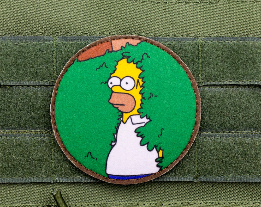 Homer Simpson hiding in bush morale patch