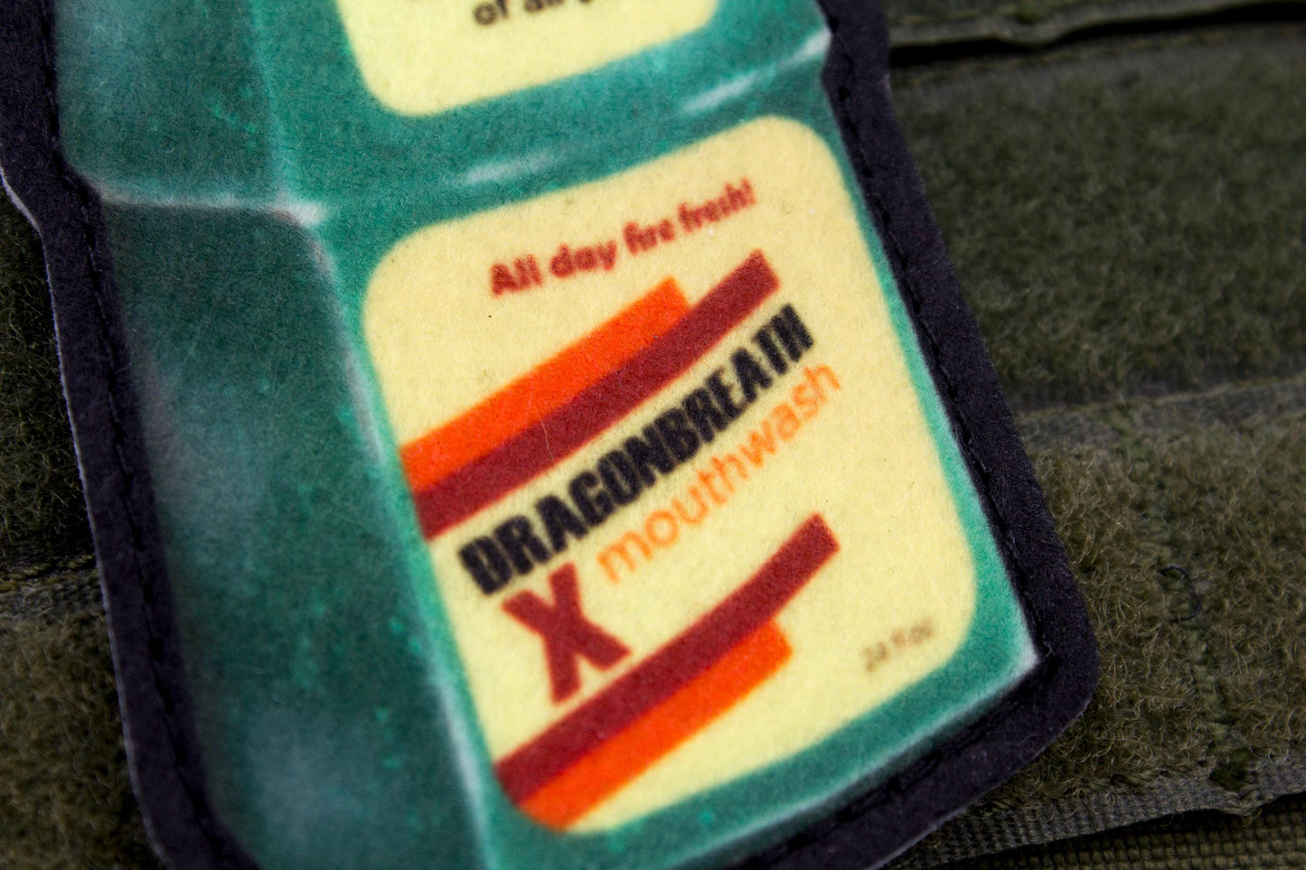 Mouthwashing bottle hook and loop morale patch