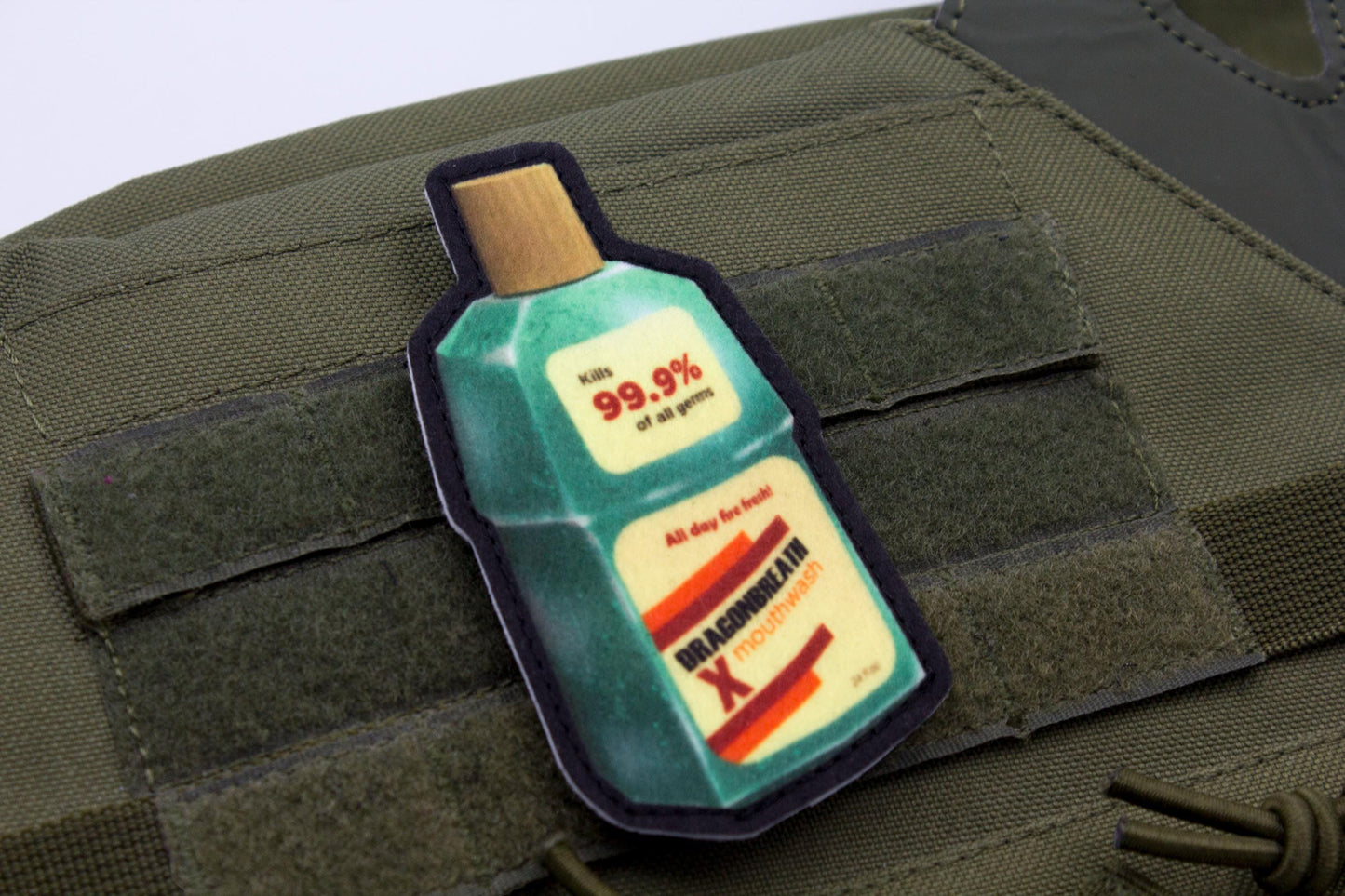Mouthwashing bottle hook and loop morale patch